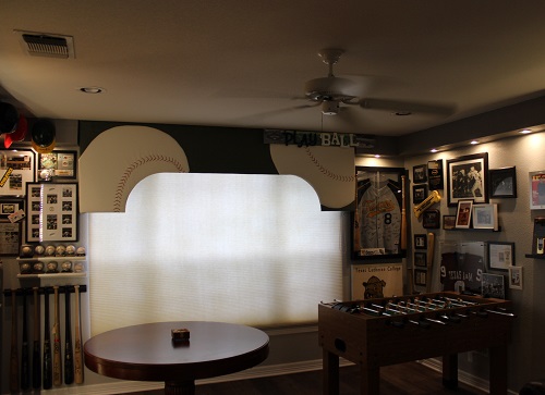 Baseballs attached to recovered valance. Team collections on right and left wall areas.